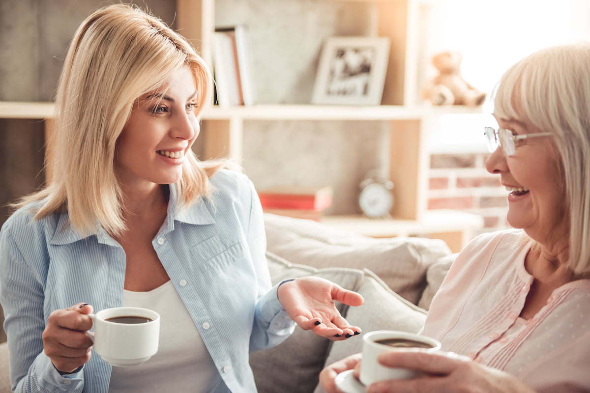 How to Have the Conversation About Assisted Living Senior Woman and Daughter Drinking Coffee and Talking_Sunscape™ Boca Raton