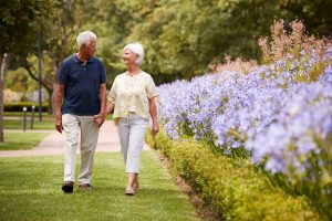 Senior Couple Walking Outside_Memory Care Boca Raton