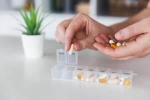 Senior Woman Organizing Pills_Boca Raton Senior Living