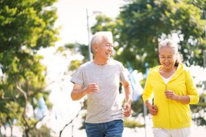 Senior Asian Couple Jogging Outdoors_New Year's Resolutions