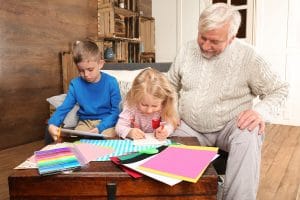 Create a New Year Vision Board with Your Grandchildren Grandparent bonding with his grandchildren