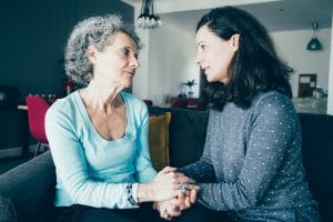 Why Do Seniors Resist Assisted Living? Adult daughter talking to her mother