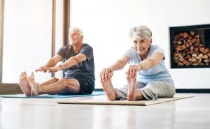 7 Arthritis-Friendly Exercises Older Adults Should Try Seniors stretching together