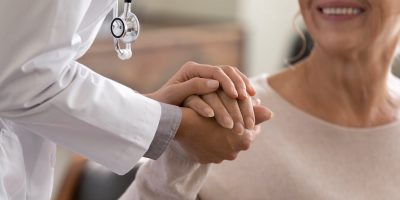 Senior Woman is Greeted by Doctor_Senior Living in Boca Raton