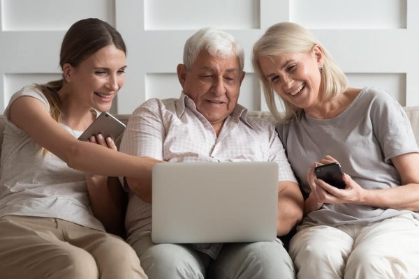Older Adult Researching Senior Living Older adults researching senior living options online with daughter.