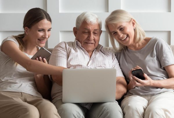 Older Adult Researching Senior Living Older adults researching senior living options online with daughter.